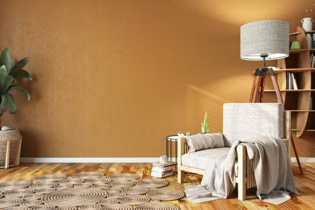 Уютный уголок гостиной с бежевым креслом, торшером, приставным столиком и узорчатым ковриком.